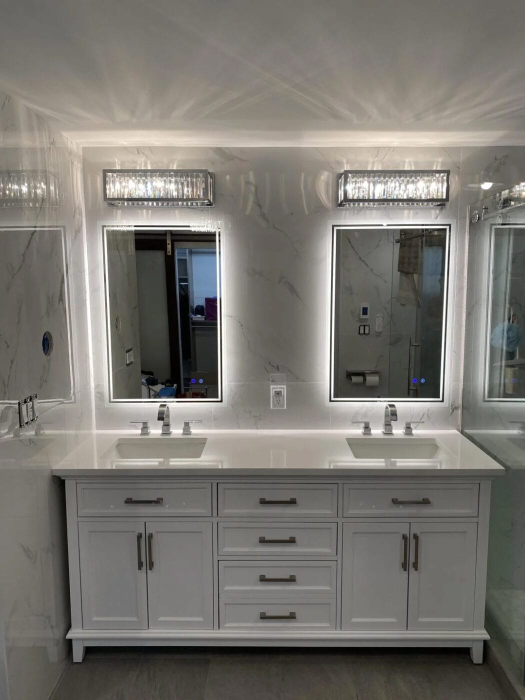 New lighting installed on bathroom walls around windows